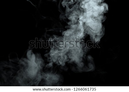 Abstract powder or smoke isolated on black background,Out of focus 