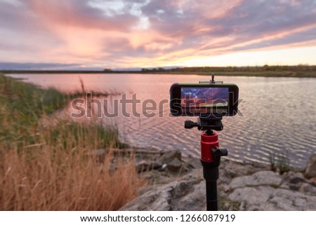 shooting a landscape on a smartphone on a tripod