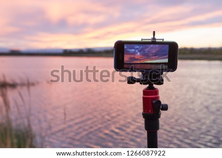shooting a landscape on a smartphone on a tripod