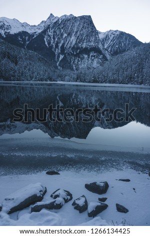  Austrian Alps, winter atmosphere. Landscape protection area Achstürze. Lake Piburger See, Tirol oldest nature preserves. Oetz alps, unique cultural mountains landscape, alps in the background. 