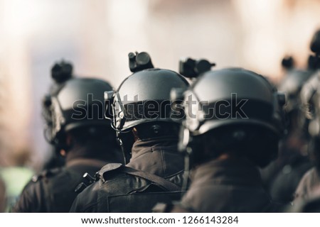 anti terrorism squad with military equipment with special tactical force counter terrorism assault technology Royalty-Free Stock Photo #1266143284