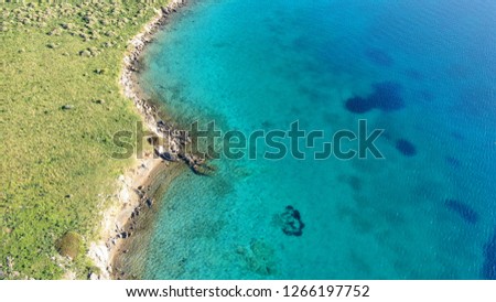 Aerial drone photo of tropical island rocky seascape with emerald clear calm ocean