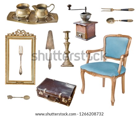 Set of 13 gorgeous old vintage items. Antique slul, coffee grinder, milk jug, sugar bowl, frame, suitcase, candlestick, cutlery. Isolated on white background.