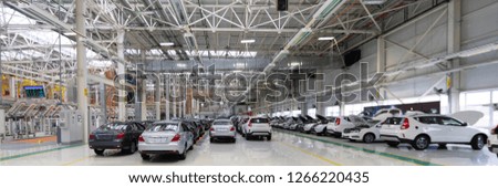 Automotive production line. Long format. Wide angle view of plant of automotive industry. Can be used as a banner