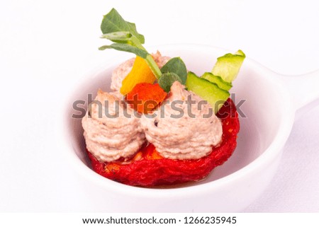 Vegetable snack with greens and pieces of pepper