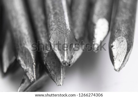 Set of metal nail on white background. Macro close-up