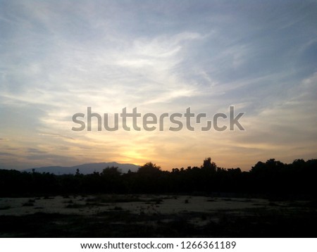 The sun is rising Royalty-Free Stock Photo #1266361189