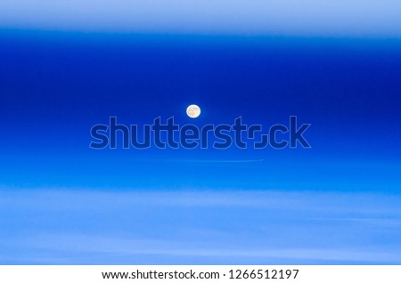 plane flying on the background of the full moon, fairy tail picture