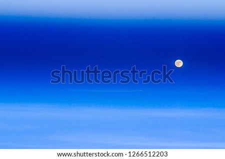 plane flying on the background of the full moon, fairy tail picture