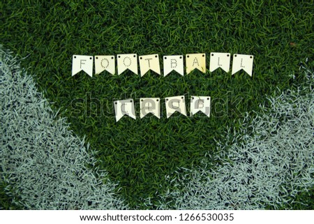 Football club words Wood letter on artificial green grass background.  Design for wallpaper, banner, Web board.