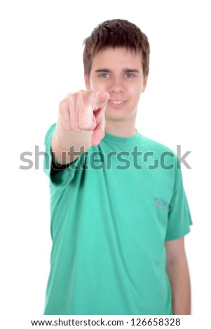 Young man isolated on white background pointing finger