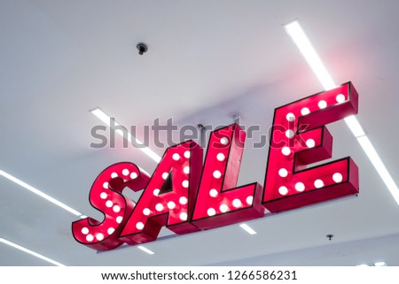 SALE Lightbox hanging in the department store - Sale signage