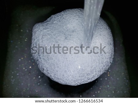 Closeup pictures of bubbles in a refreshing glass of water