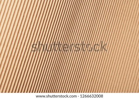 Corrugated cardboard surface as background, top view. Recyclable material