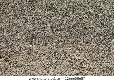 Pebbles floor, walkway has characteristics