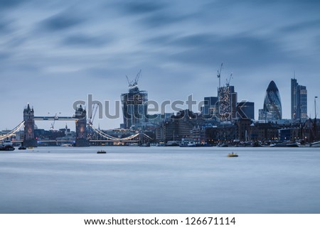 Tower Bridge and London skyline.