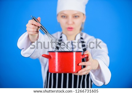 Use hand whisk. Whipping cream tips and tricks. Woman professional chef hold whisk and pot. Start slowly whisking whipping or beating cream. Whipping like pro. Girl in apron whipping eggs or cream.