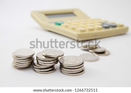 calculator with money on table no people stock photo  