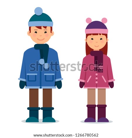 Cute twins kids boy and girl in winter clothes.