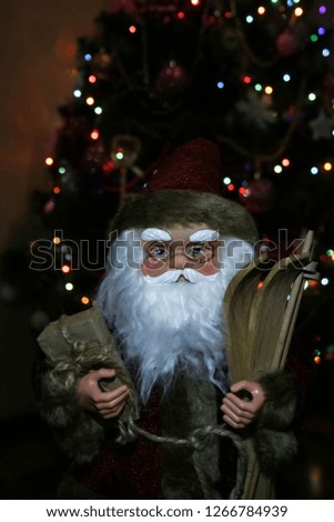 Santa Claus Portrait on the Christmas tree background