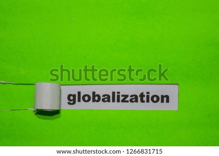 Globalization, Inspiration and business concept on green torn paper