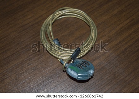 Combination lock and steel cable