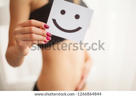 Women Health. Beautiful Female Body In Panties With Smile Card.