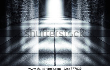 Background of an empty corridor with brick walls and concrete floor. Spotlight, smoke, neon light
