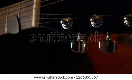 guitar headstock with tuning pegs . mediator