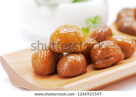 Sugar fried chestnut kernels cooked chestnut kernel Royalty-Free Stock Photo #1266921547