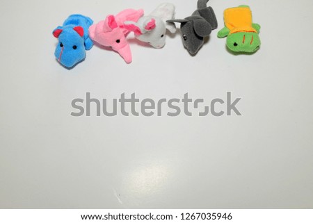 A flatlay picture of kids hand soft toy for three years old kid.