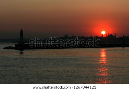 During the sunset breakwater, historical peninsula and Hagia Sofia, Istanbul, Turkey. This picture was taken from the Kadikoy District.