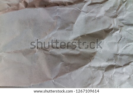 The brown paper is very crumpled.