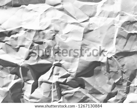 The texture of the crumpled paper background