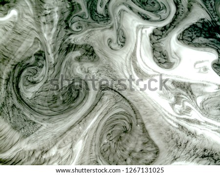 abstract background oil and water.Black and white marble. Decorative texture. Liquid paints. Watercolour stains. Abstract painted waves. Trendy background for posters, cards, invitations, websites, 
