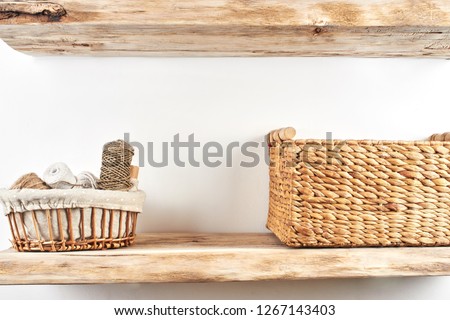 Wooden shelves with decor items. Home interior