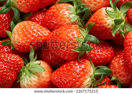 A Pile Of Strawberries                               