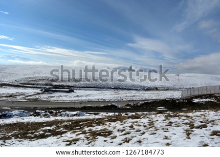 snowy mountains and blue sky.