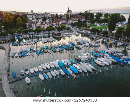 Aerial picture of harbor with small boats and yachts.