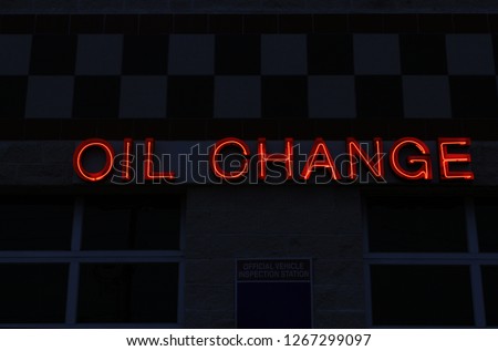 Neon Oil Change Sign at Service Department
