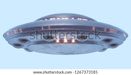 Unidentified flying object on light blue neutral background. Image with clipping path included.  Royalty-Free Stock Photo #1267373185