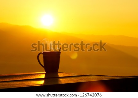 Silhouettes on sunrise morning coffee. Royalty-Free Stock Photo #126742076