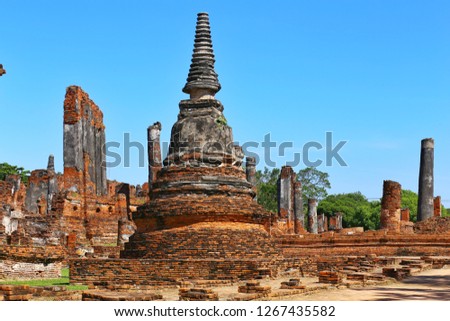 The ancient pagoda in Chaiwatthanaram Temple,blue sky background, Ayutthaya ,Thailand. 