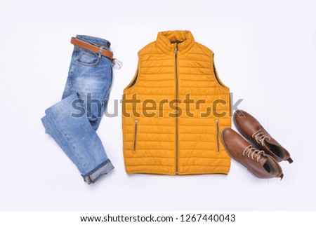 Yellow Warm clothes with blue jeans and leather shoes - white background
