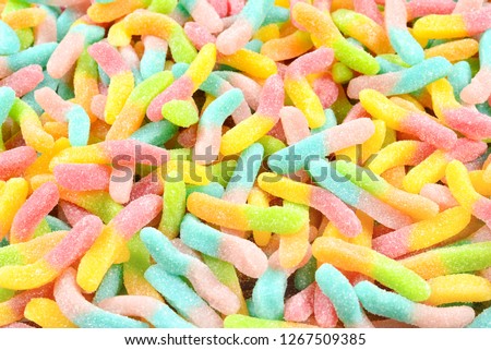 Juicy colorful jelly sweets. Gummy candies. Snakes.  Royalty-Free Stock Photo #1267509385