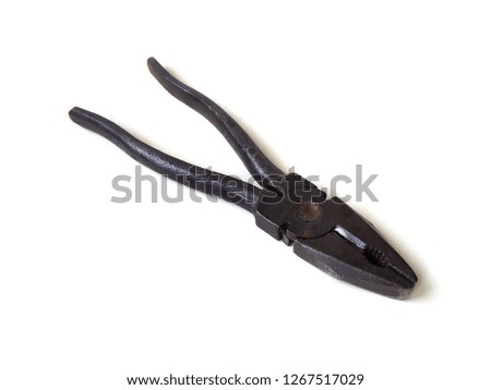 Closeup of old pliers on white background.