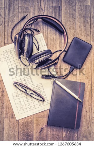 OFFICE TABLE WITH HARD DISC CASES AND NOTEBOOK WITH CLASSES