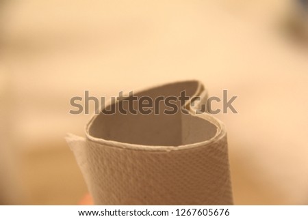 Hart shape of an empty toilet paper roll