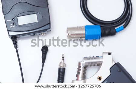 Audio recording theme. Microphone and connection isolated on white background