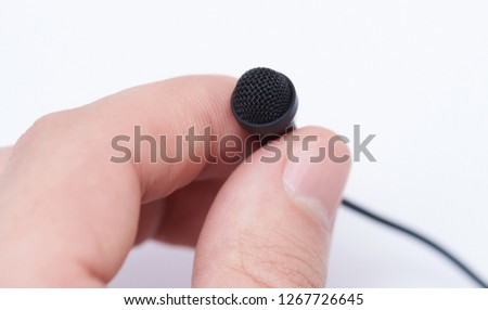 Lavalier microphone close up view isolated on white background